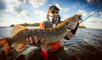 Wall Mural - Fishing. Fisherman and trophy Pike.