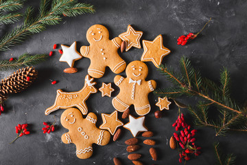 Wall Mural - Gingerbread  cookies on a gray background.  Christmas cookies.  Ginger men