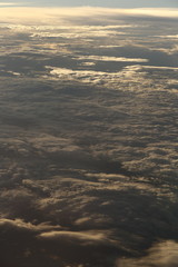 Wall Mural - Sunset White Cloud sky at high level attitude, view from window airplane