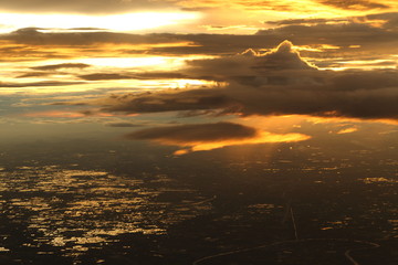Wall Mural - Sunset White Cloud sky at high level attitude, view from window airplane