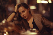 © kichigin19 - portrait of a pensive girl in a restaurant at the table