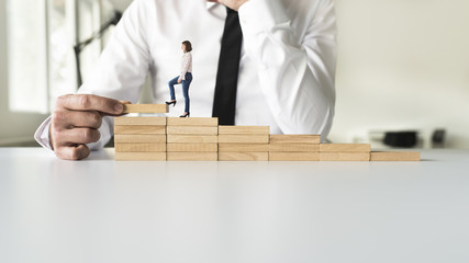 Wall Mural - Business teamwork climbing the steps to success