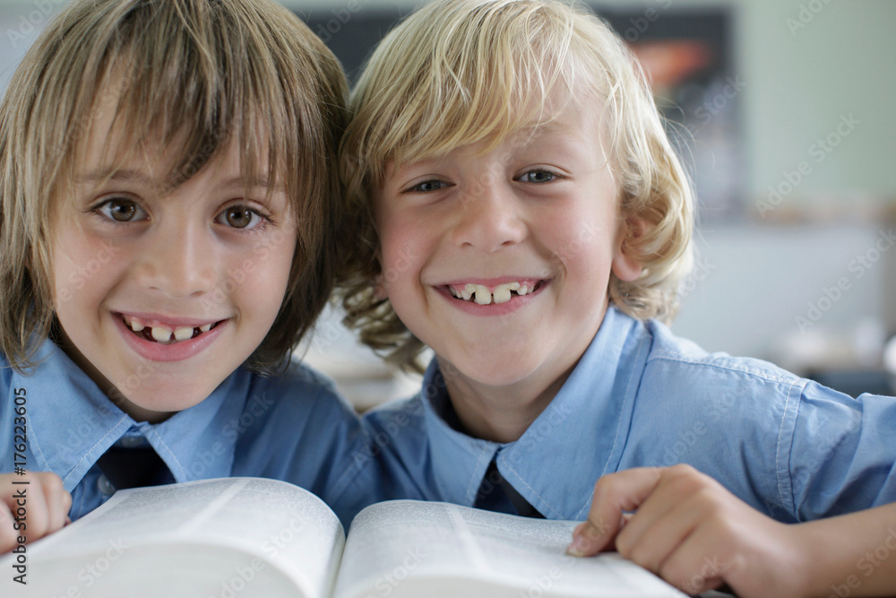 Reading Boy Inclass School boys reading in class Stock Photo | Adobe Stock