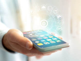 Home button of a technology interface surrounded by application - technology app concept