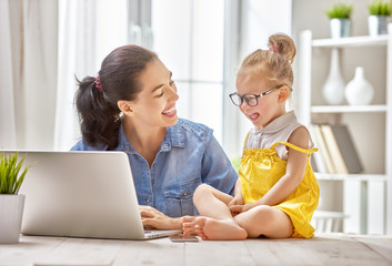 mother with toddler working