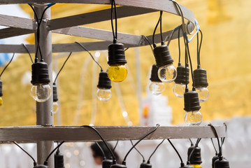 Yellow electric lamp, Thailand.