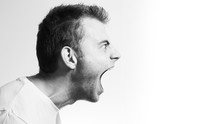 Screaming Angry Aggressive Militant Man Profile On A White Background, Black And White Portrait, Evil