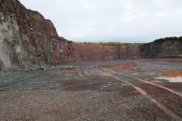 Wall Mural - View into a quarry mine for porphyry rocks.