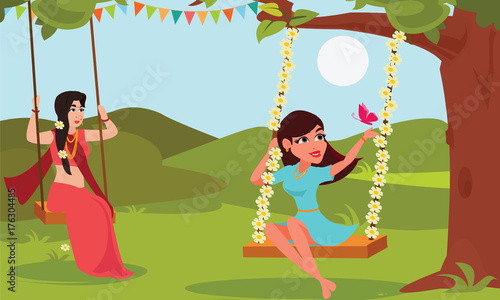 Young woman playing swings tied on tree branches. Raja Parba or ...