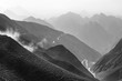 Winding mountain road on the Tibetan plateau black-and-white photo.