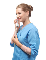 Poster - Young female receptionist talking on phone, isolated on white