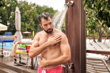 Handsome Young Man Taking Shower, Outdoors