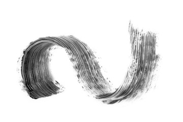 Wall Mural - Black mascara brush stroke isolated on white