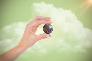 Poster - Composite image of woman presenting with her hand