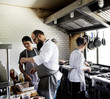 © Rawpixel.com - Group of chefs working in the kitchen