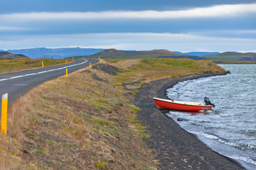 Wall Mural - Iceland Landscape with a Red Boat