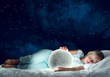 © adam121 - Girl in her bed and moon planet