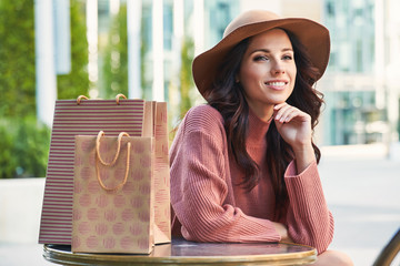 Wall Mural - happy woman with shopping bags