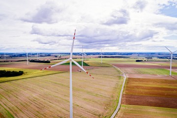 Wall Mural - Aerial drone view on wind electricity generator