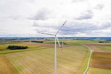 Wall Mural - Aerial drone view on wind electricity generator