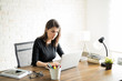 © AntonioDiaz - Latin woman working on her computer