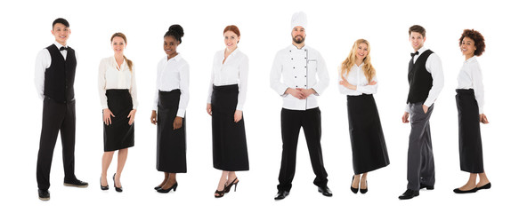 Wall Mural - Portrait Of Happy Young Restaurant Staff