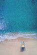 © Netfalls - Aerial view of a Woman at the beach
