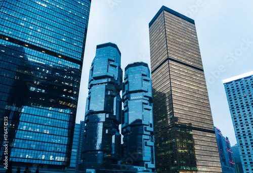 Photo directly below of modern financial skyscrapers in central Hong Kong,blue toned,china