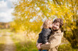 © Alinsa - Father and daughter walking together, autumn day.