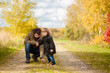 © Alinsa - Father and daughter walking together, autumn day.
