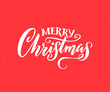 Merry Christmas. Handmade lettering for greeting card, vintage style. White calligraphy on red background.