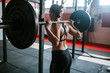 © Alina Schessler - Fitness girl lifting weights