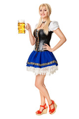 Wall Mural - Full length portrait of a blond woman with traditional costume holding beer glasses isolated on white background.