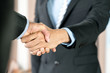 © godshutter - Businessman shake hands agree deal of big lot sales that finish goal of marketing plans of the company