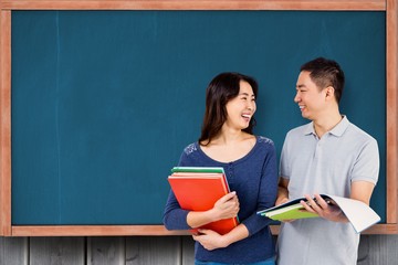 Sticker - Composite image of couple smiling at each other while holding