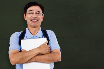 Composite image of portrait of cheerful man holding documents