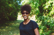 © goodvibrations/Stocksy - Black woman wearing sunglasses outdoors