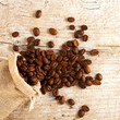 Coffee beans in a burlap bag, can be used as background
