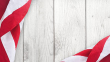 American Flag Over Whitewashed Wood Background For United States Holidays