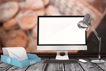 Wall Mural - composite image of a computer over a desk