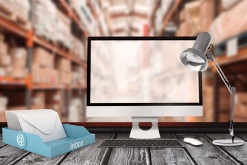 Wall Mural - composite image of a computer over a desk