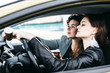 © speed300 - Two girls are riding in a car