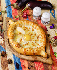 Ajarian Khachapuri traditional Georgian cheese pastry on plate