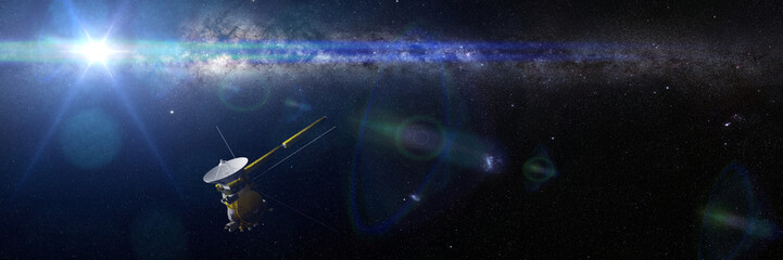 Wall Mural - spacecraft cassini in front of the milky way galaxy