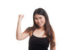 © halfbottle - Successful  young Asian woman hold fist up.