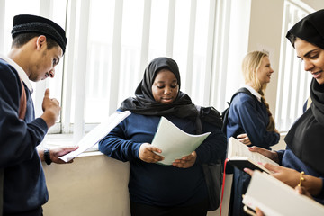 Wall Mural - Diverse Muslim children studying in classroom