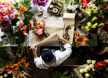 Florist Making A Flower Arrangement In A Flower Shop