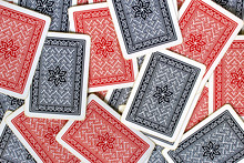 Texture Of Red And Blue Playing Cards Back Spread On A Table