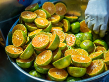 Seller Prepares Oranges To Make Orange Juice