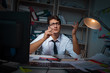© Elnur - Man businessman working late hours in the office